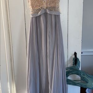 Bejeweled top with periwinkle bottom. Long dress.